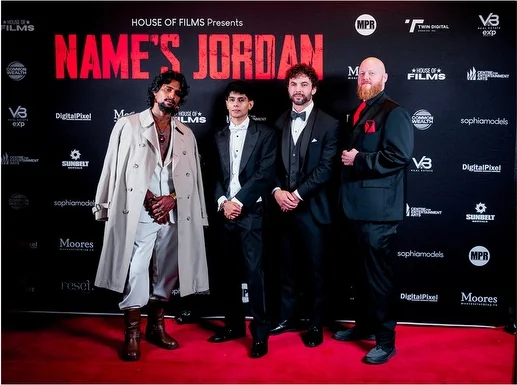 Cast and crew on the Name's Jordan red carpet